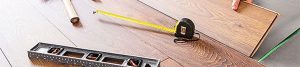 Measuring tape and flooring